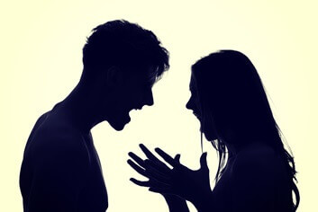 silhouette of arguing couple